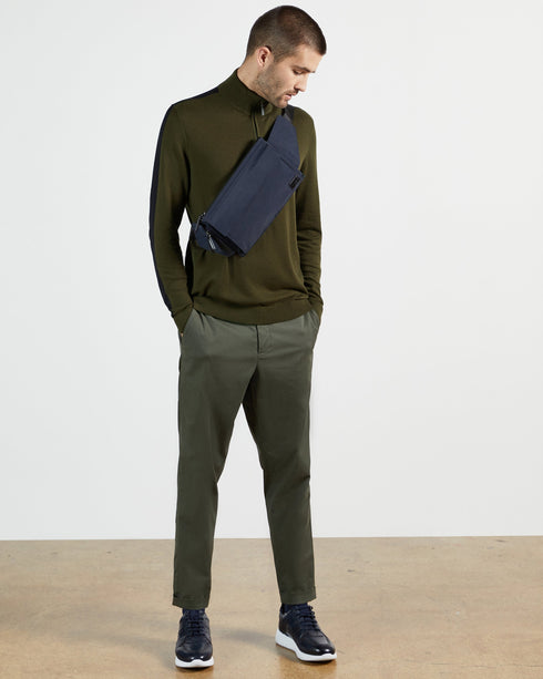 <P Class="Description">Set Your Stripes. Ofica Is A Simple, Everyday Top With An Extra Touch Of Versatility. The Zip?Ôøω?¬...